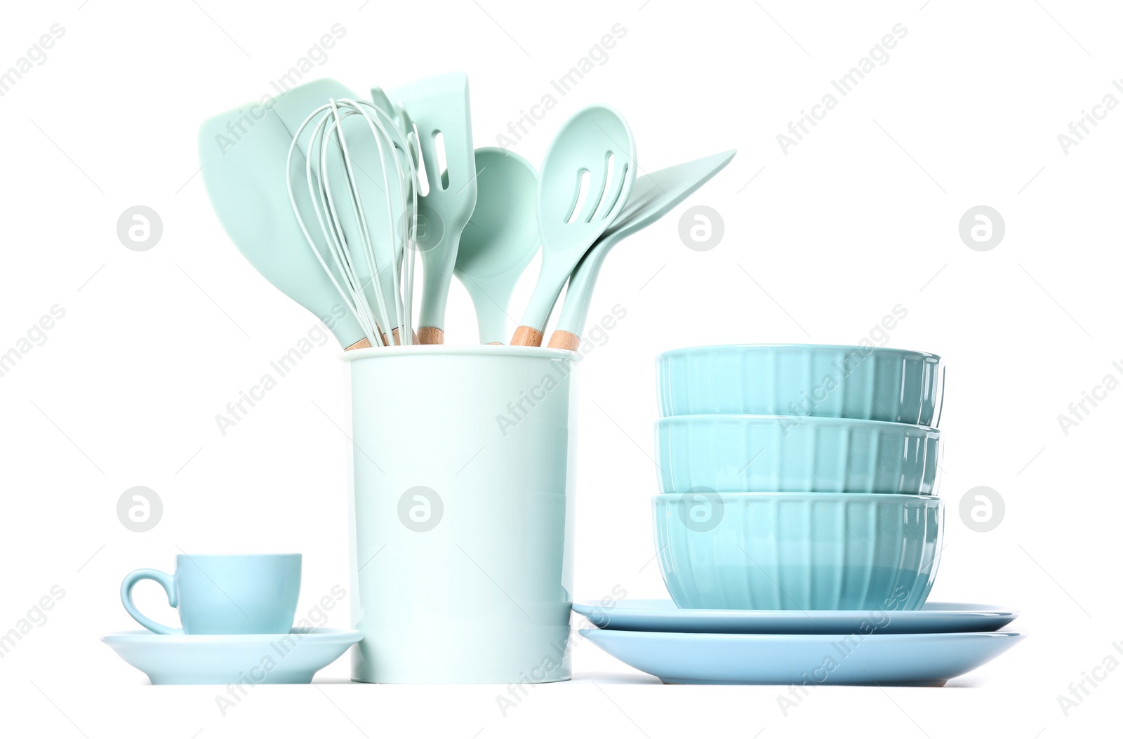 Photo of Set of different cooking utensils isolated on white