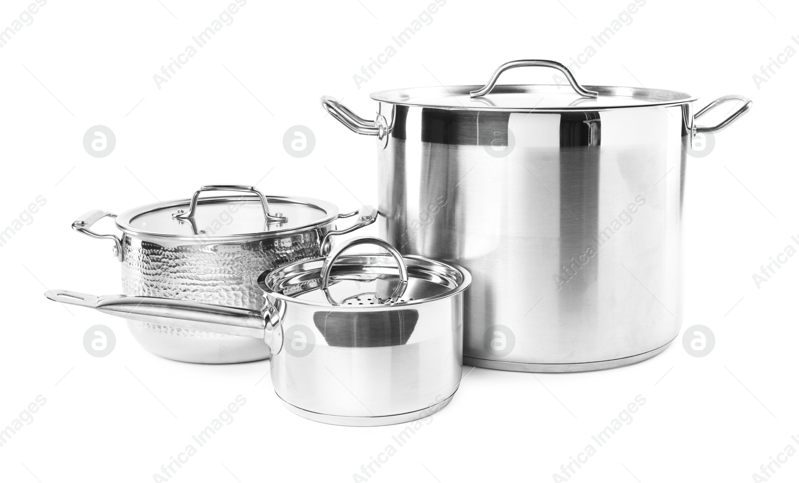 Photo of Set of different cooking utensils isolated on white