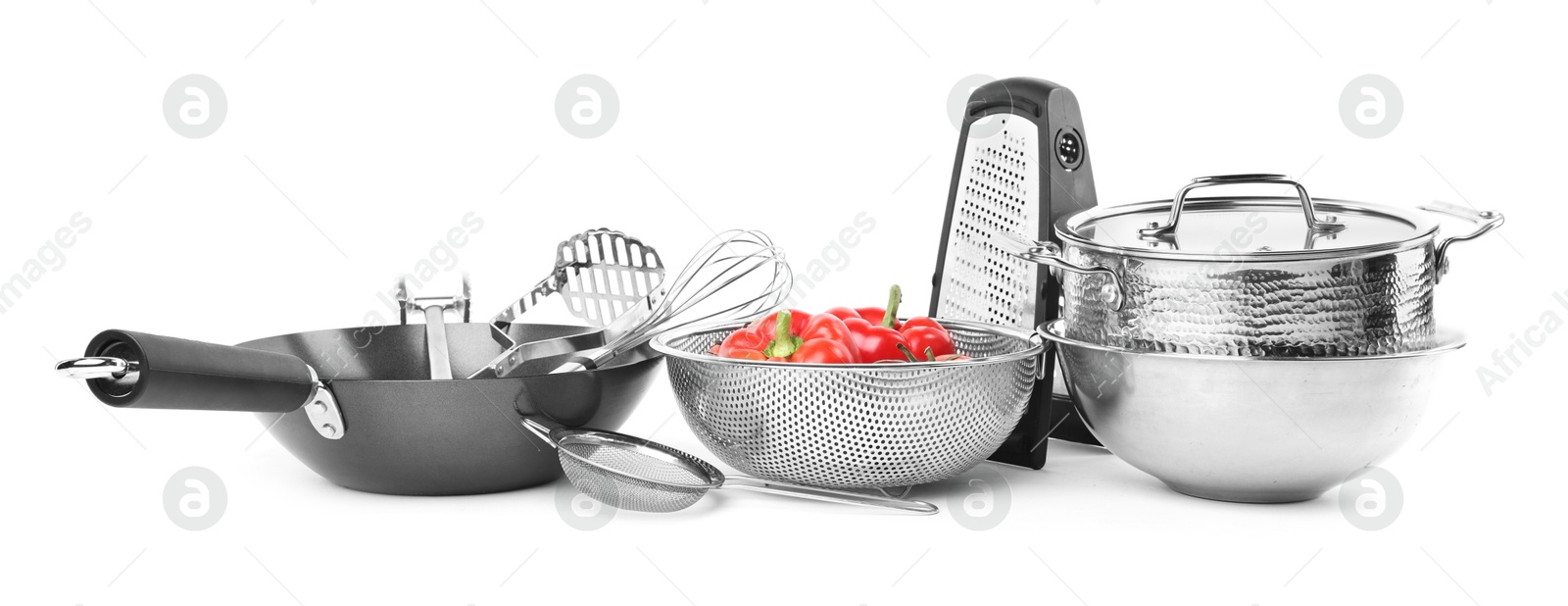 Photo of Different cooking utensils and products isolated on white