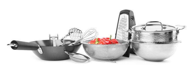 Photo of Different cooking utensils and products isolated on white