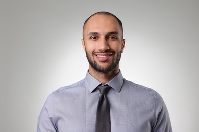 Photo of Portrait of businessman on light gray background