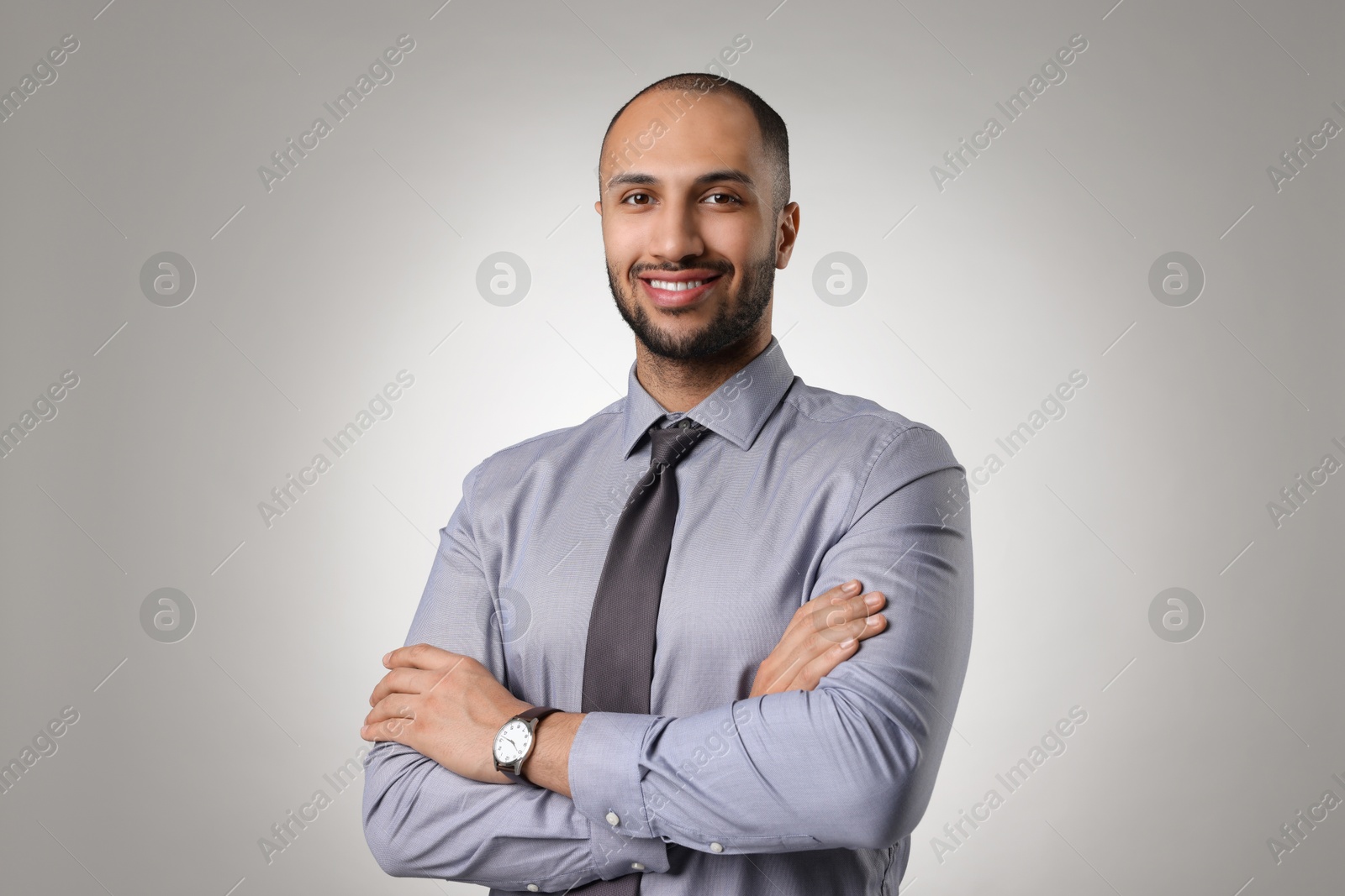 Photo of Portrait of businessman on light gray background