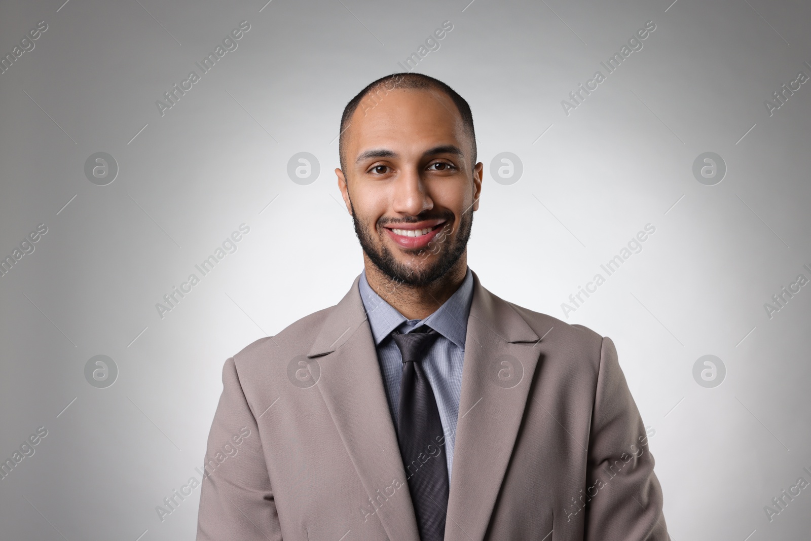 Photo of Portrait of businessman on light gray background