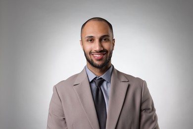 Photo of Portrait of businessman on light gray background