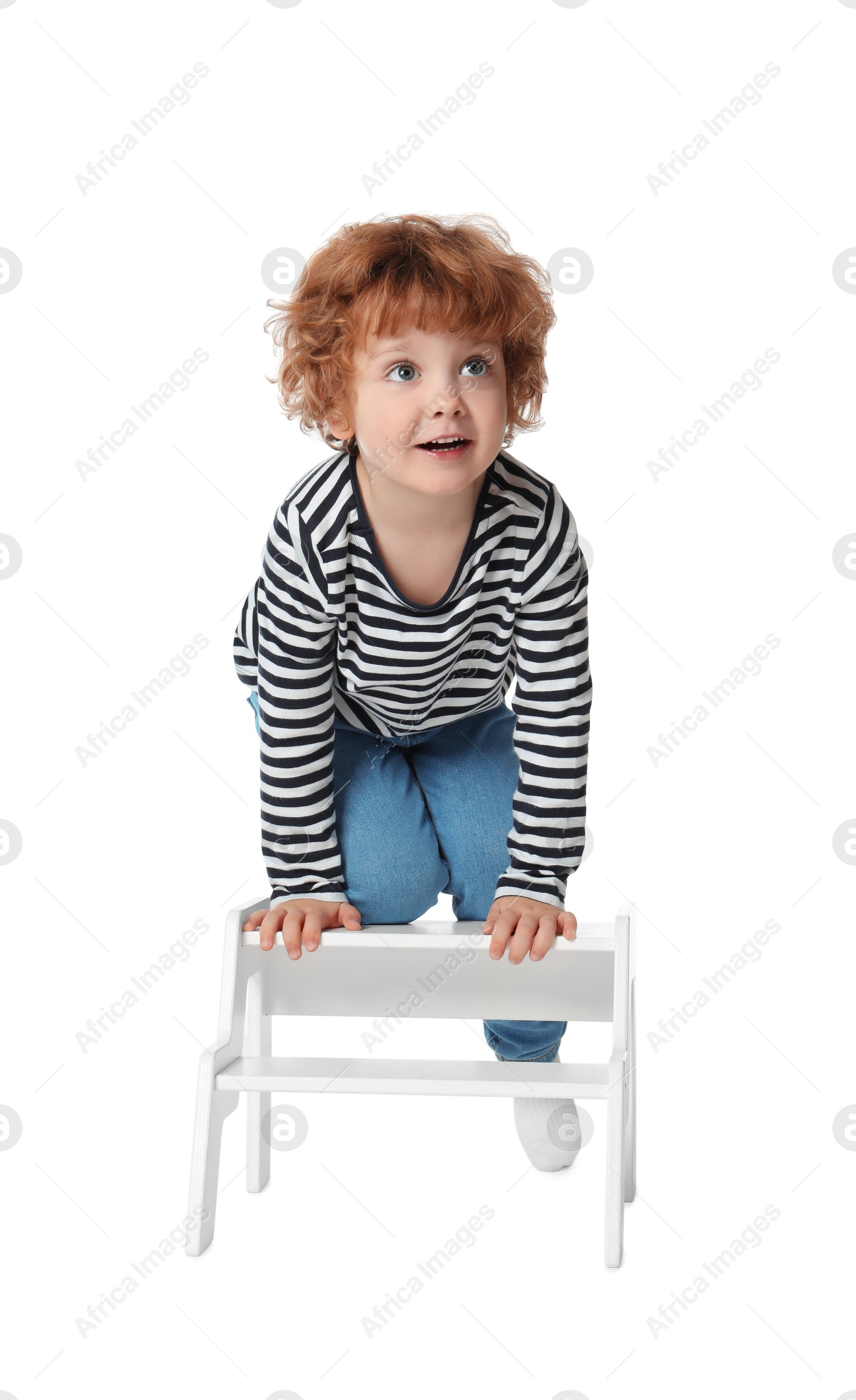 Photo of Little boy with step stool on white background