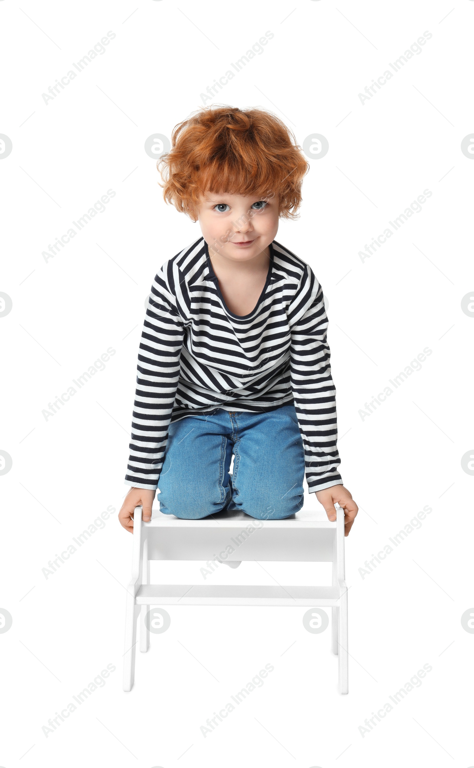 Photo of Little boy with step stool on white background