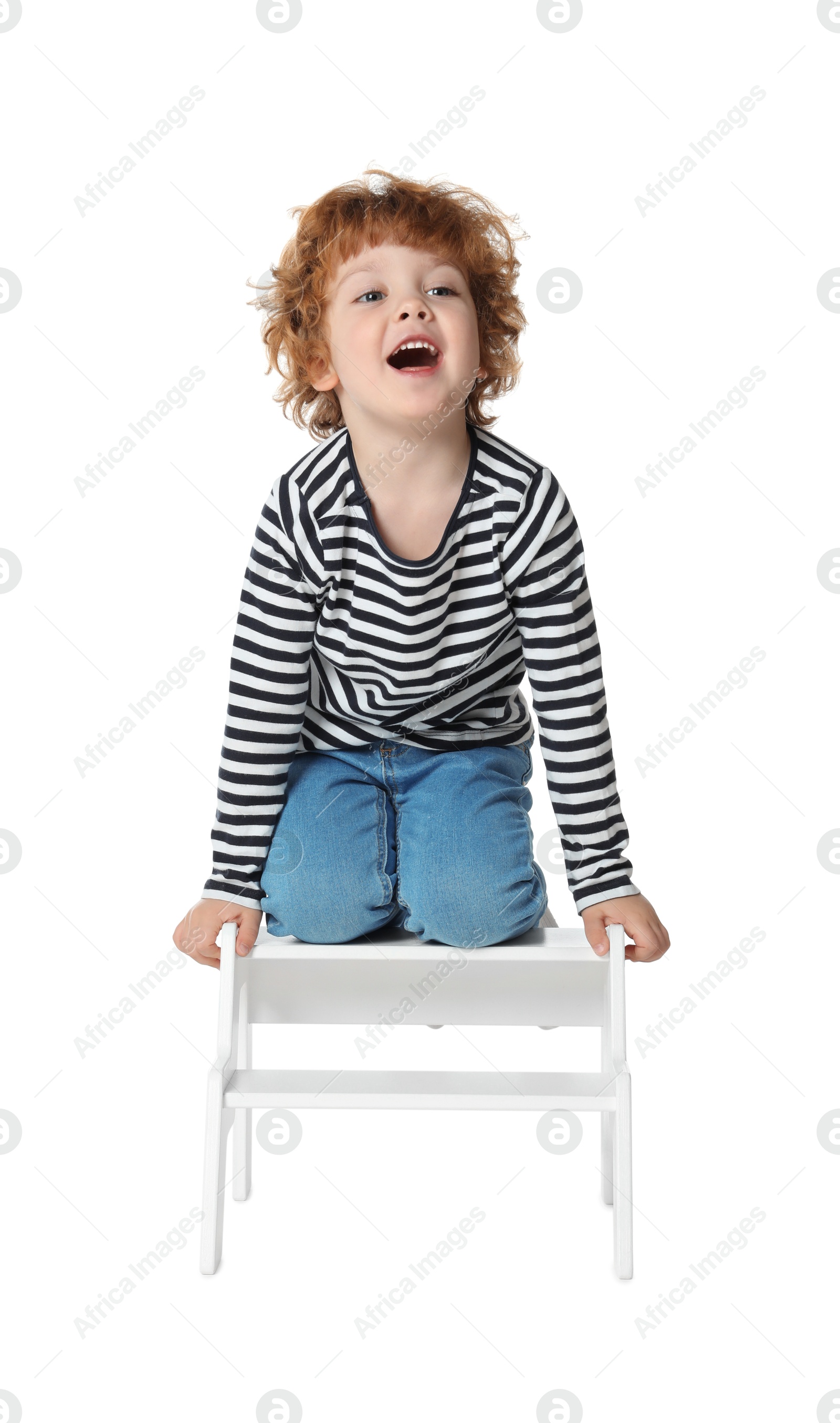 Photo of Little boy with step stool on white background