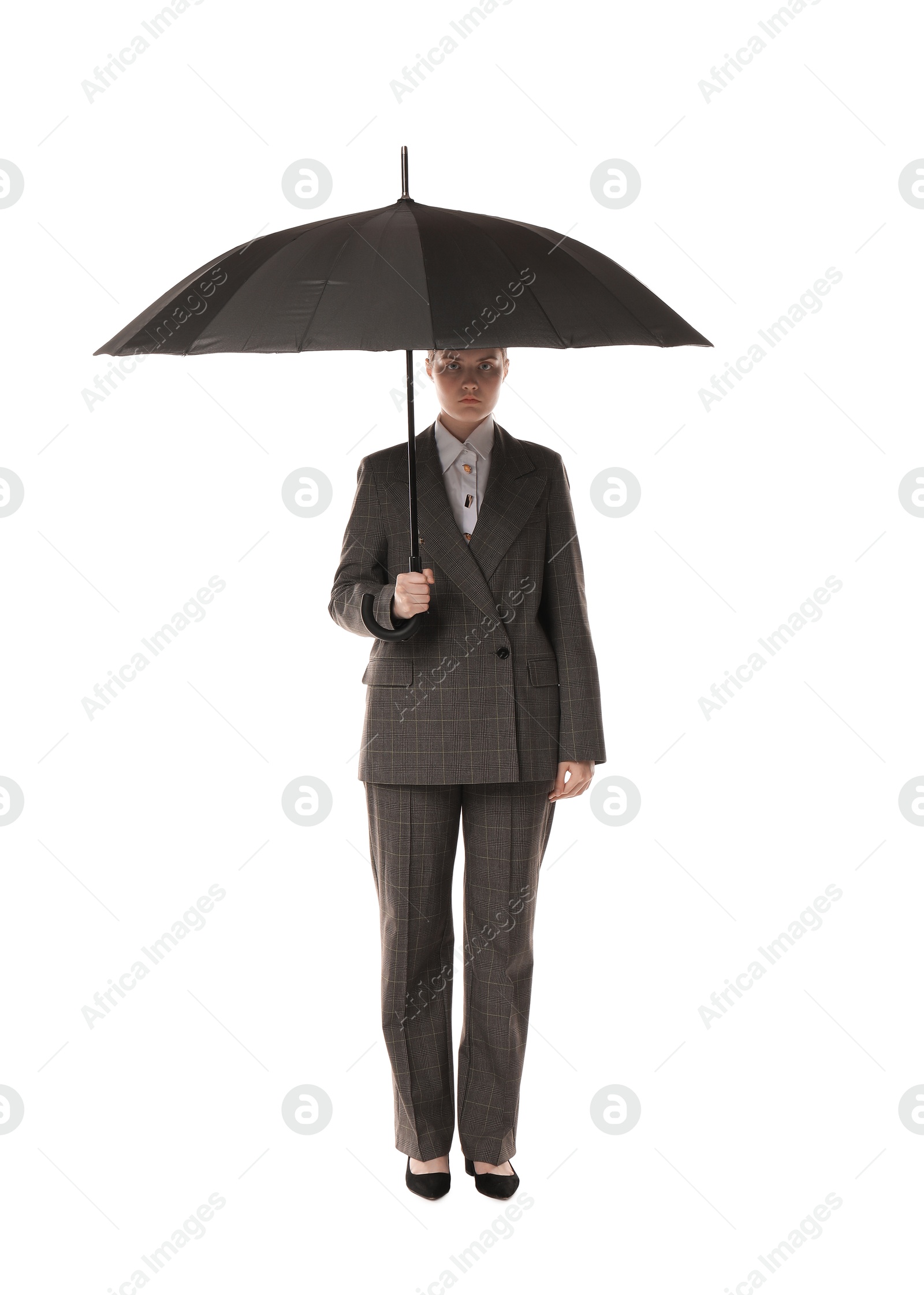 Photo of Young woman with black umbrella on white background