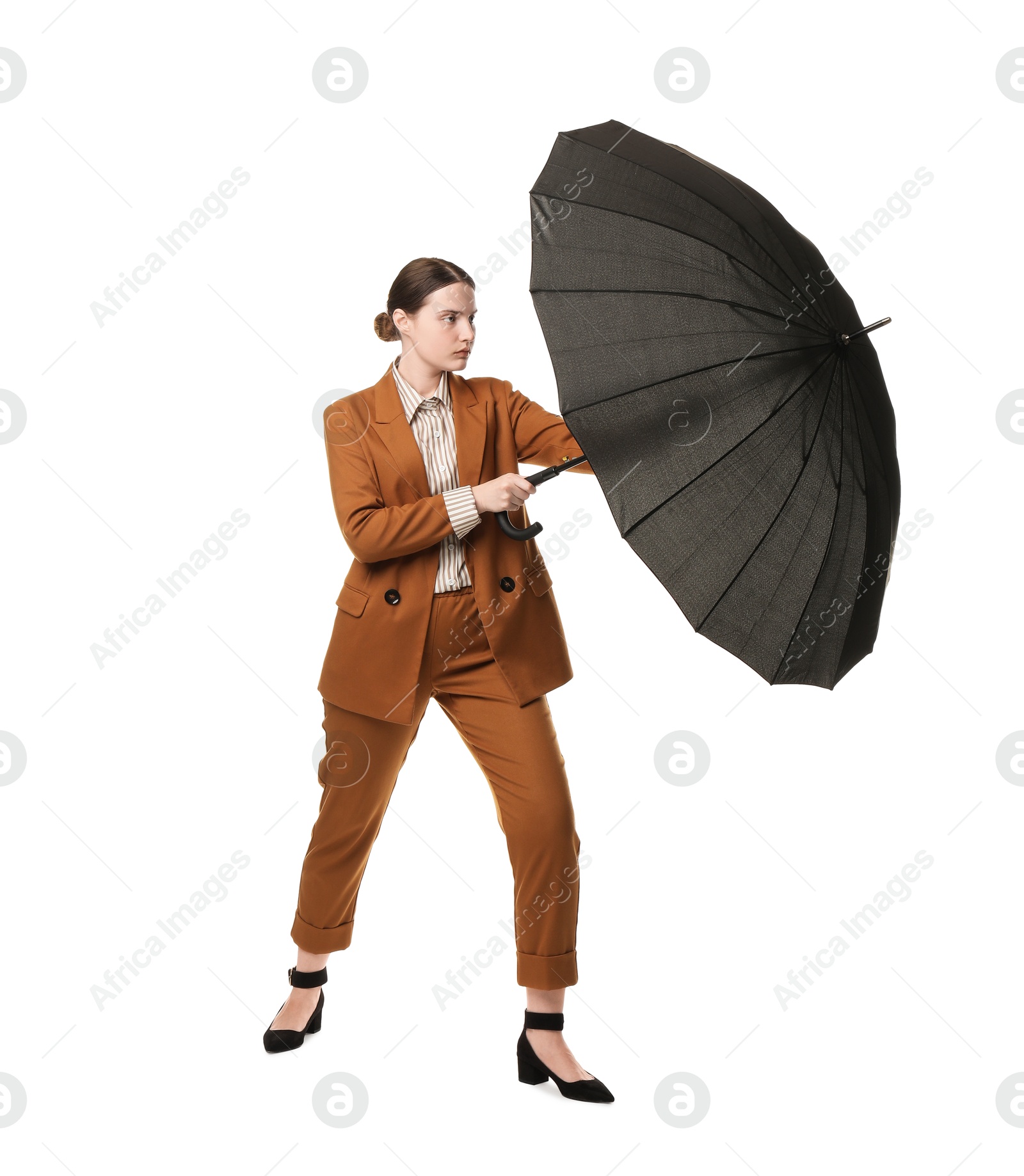 Photo of Young woman with black umbrella on white background