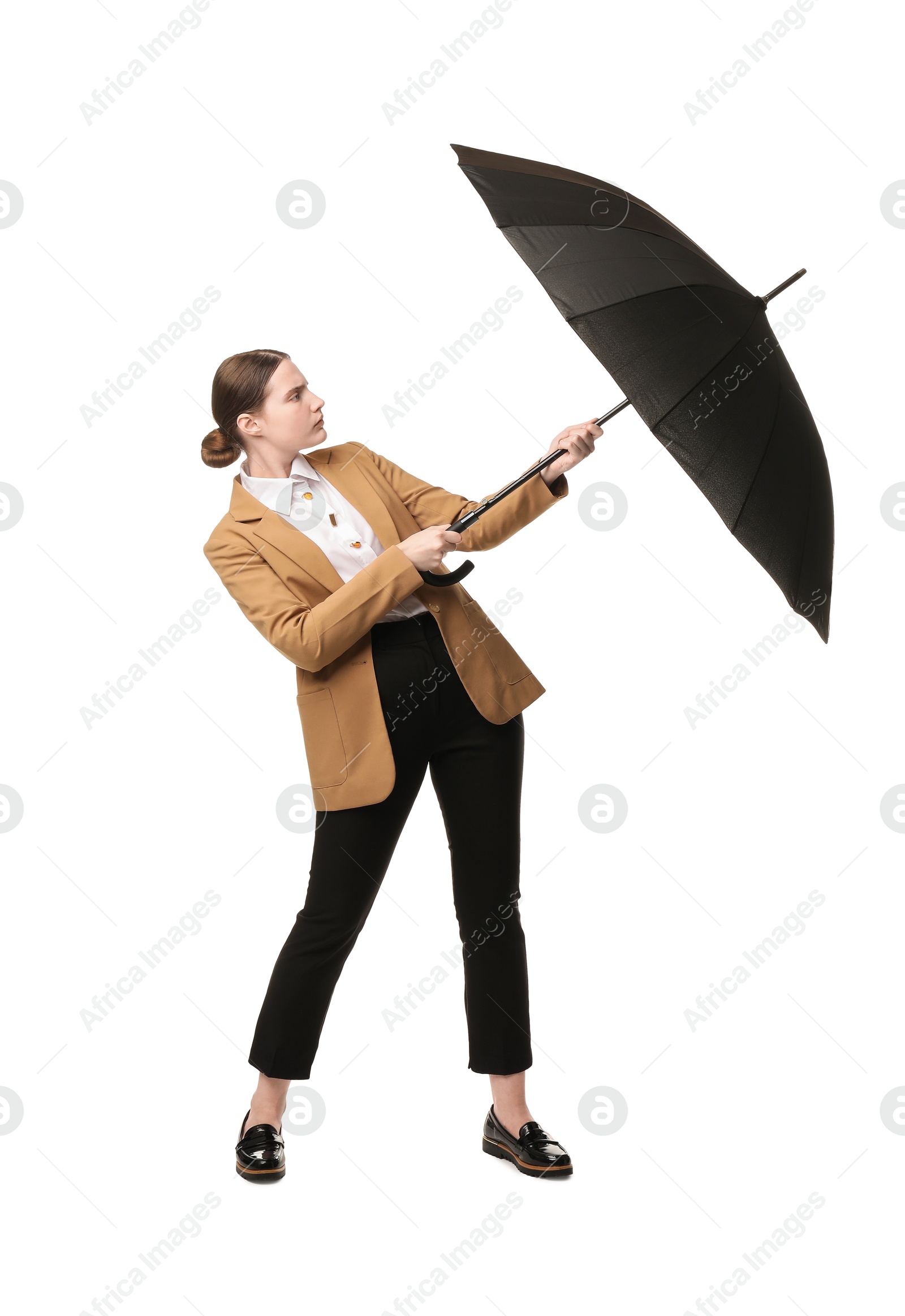 Photo of Young woman with black umbrella on white background