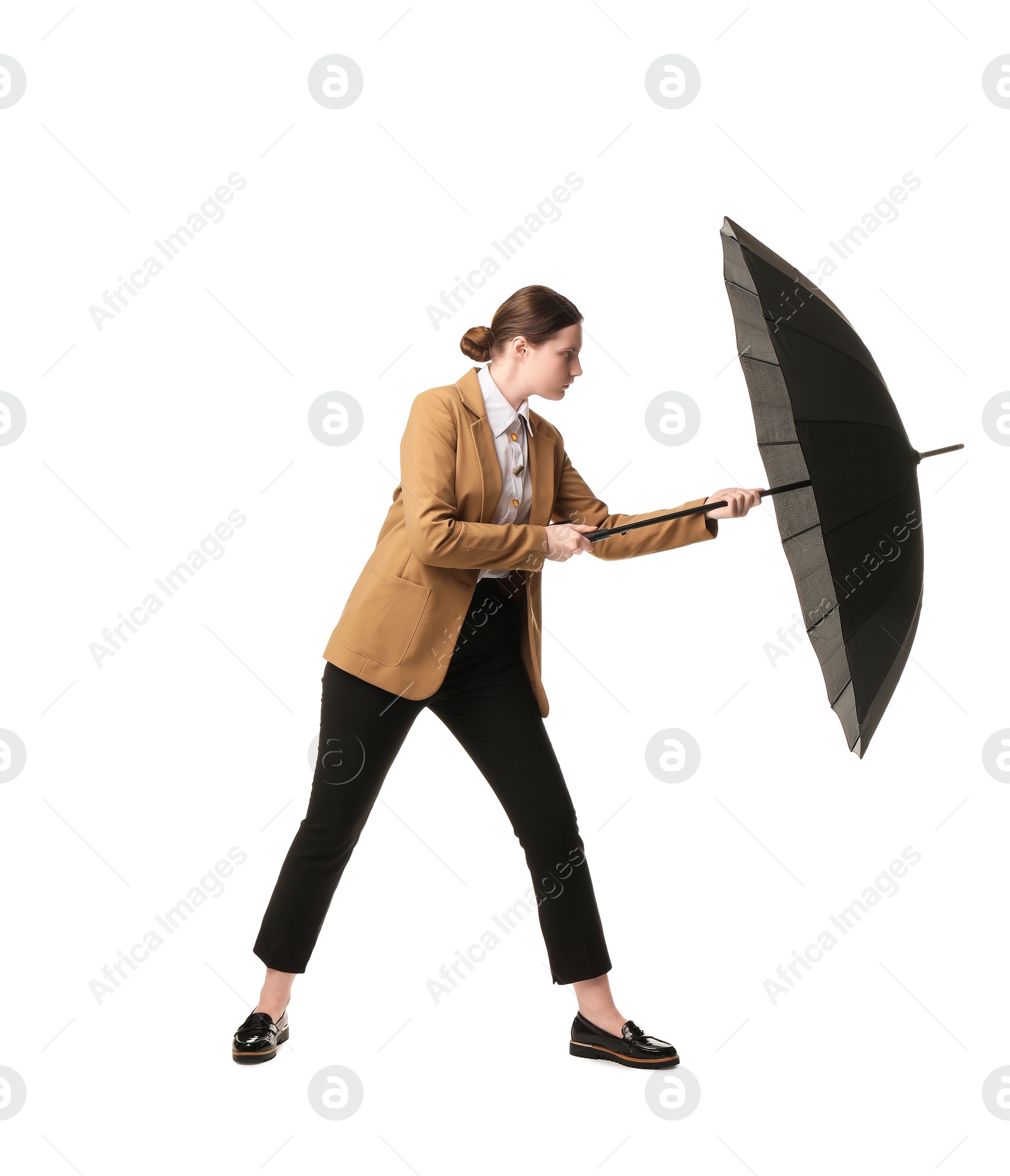 Photo of Young woman with black umbrella on white background