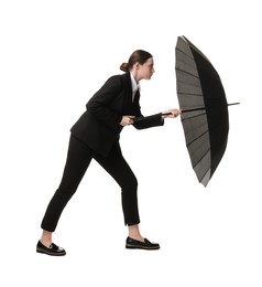 Photo of Young woman with black umbrella on white background