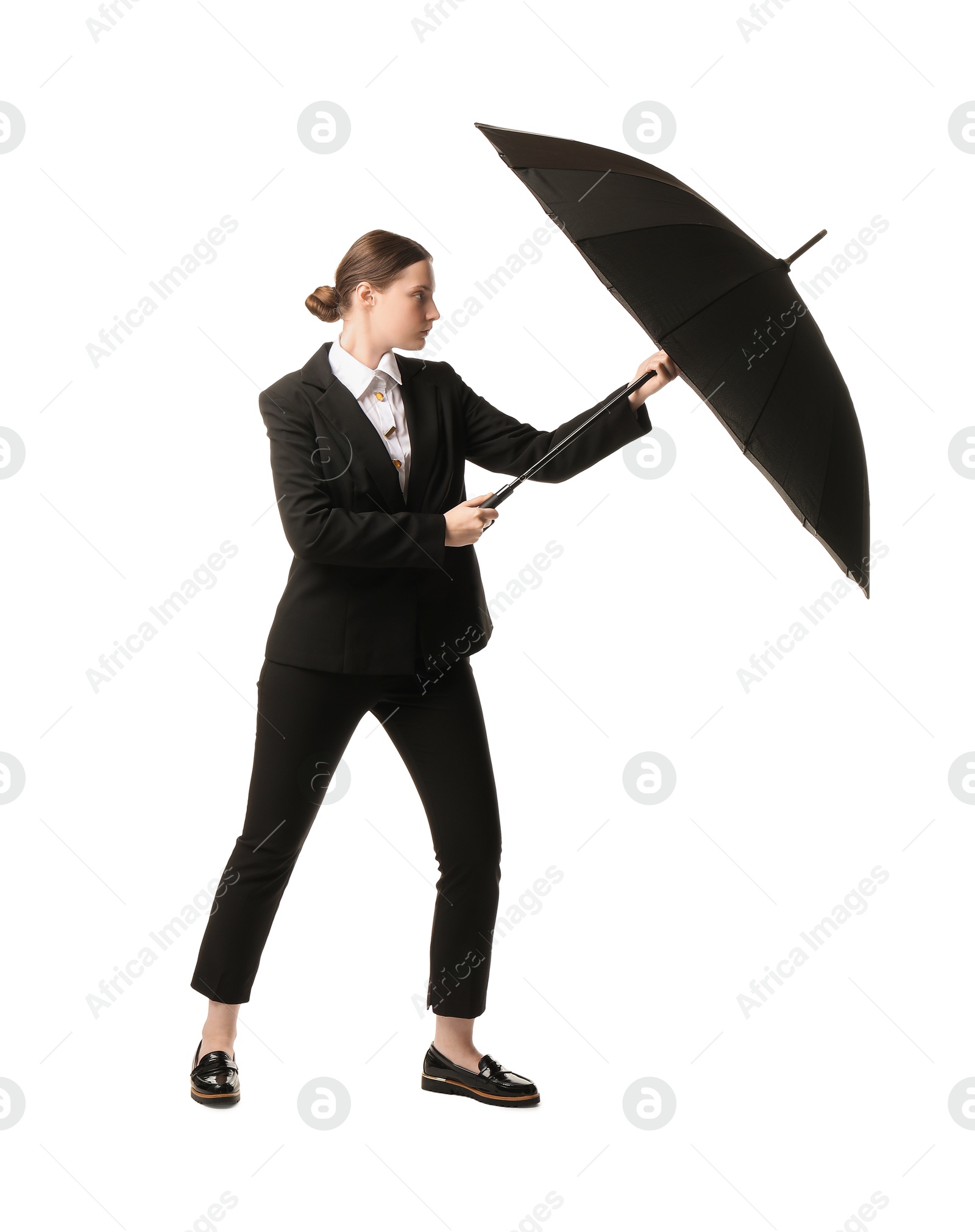 Photo of Young woman with black umbrella on white background