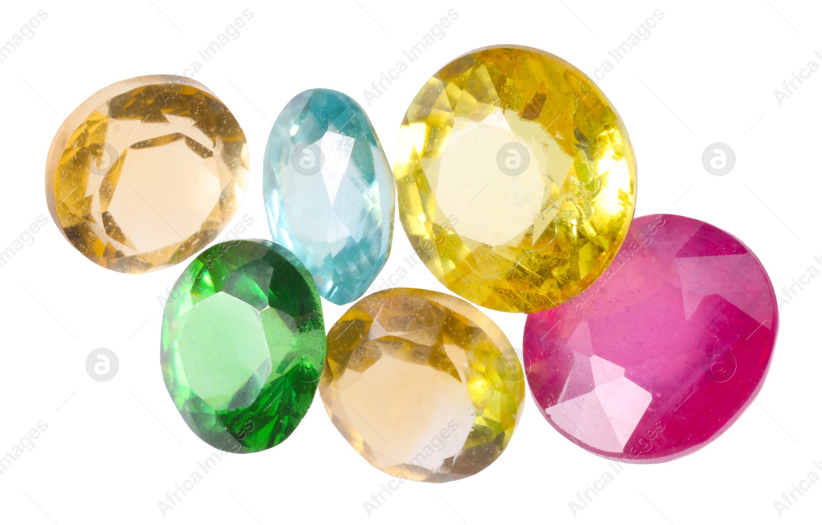 Photo of Different colorful shiny gemstones isolated on white