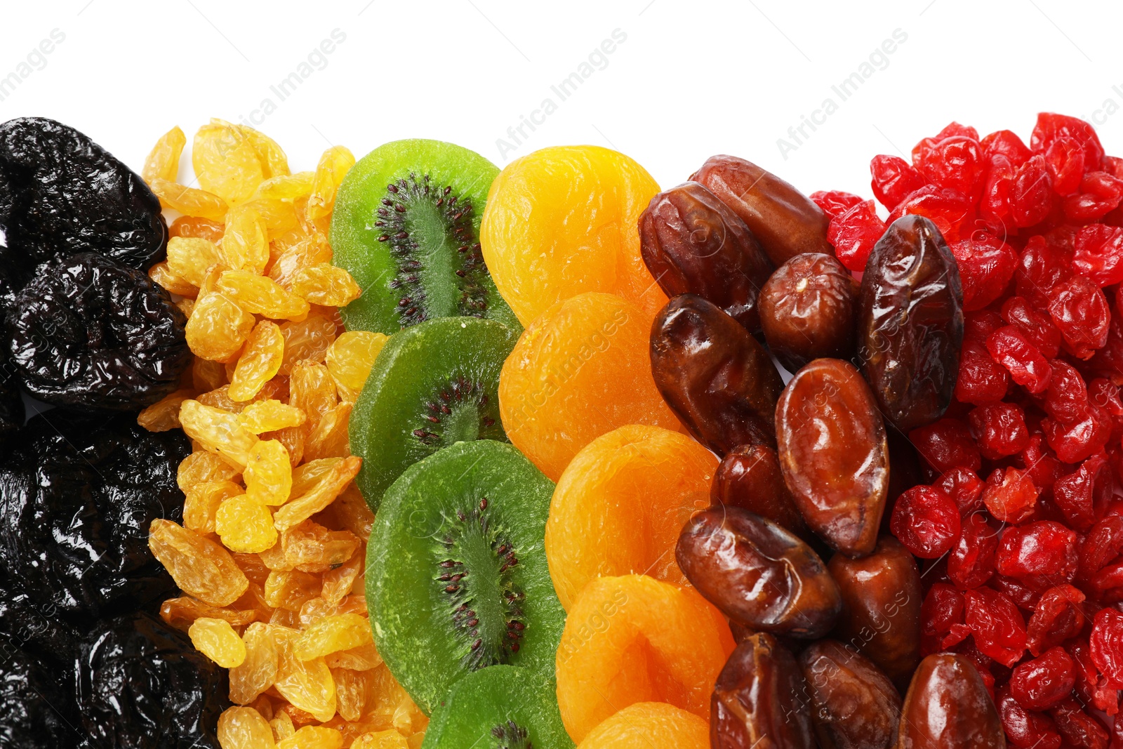 Photo of Different dried fruits isolated on white, top view