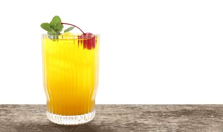 Photo of Tasty pineapple cocktail with mint and cherry in glass on wooden table against white background, space for text