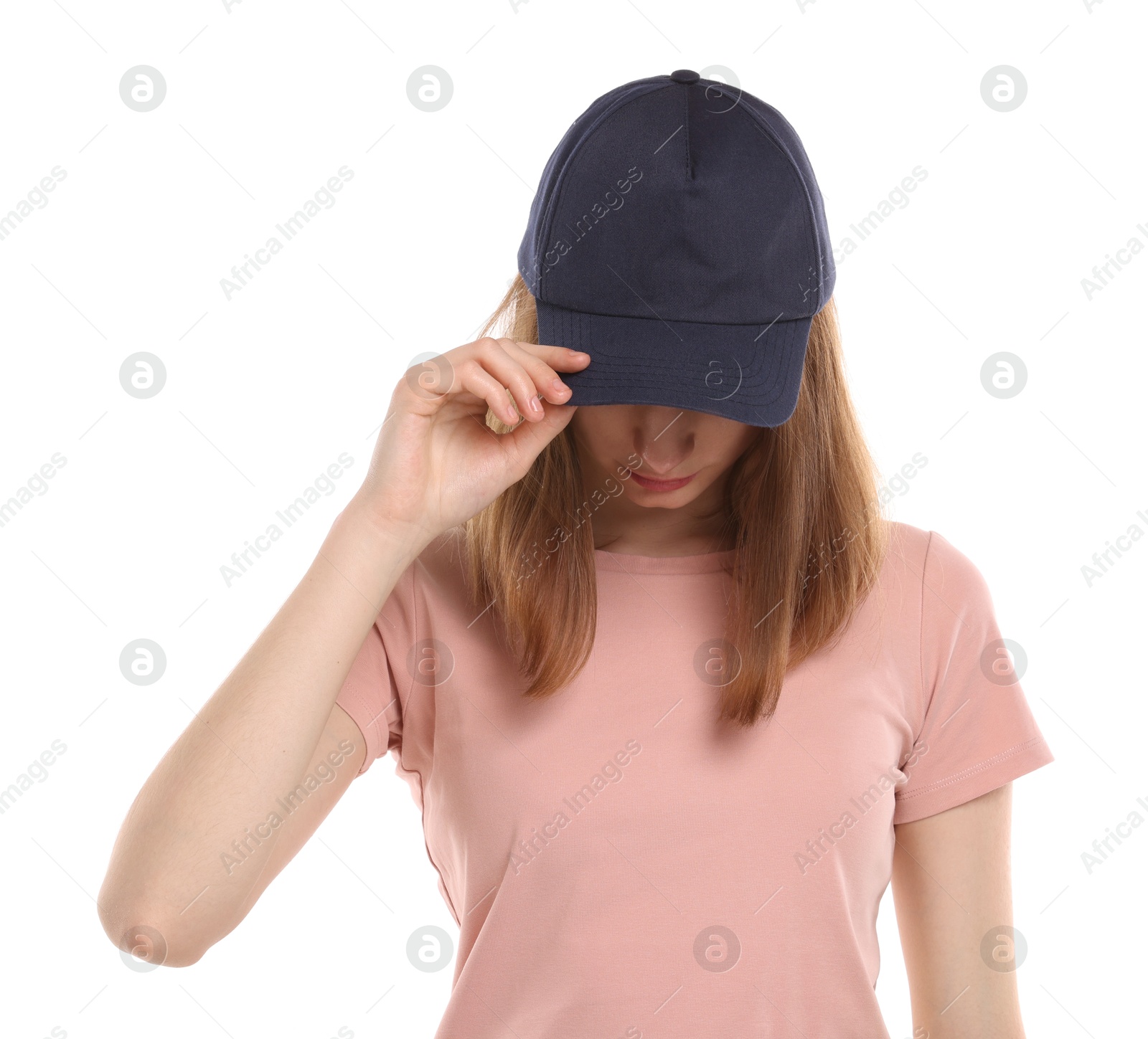 Photo of Woman in stylish baseball cap on white background. Mockup for design