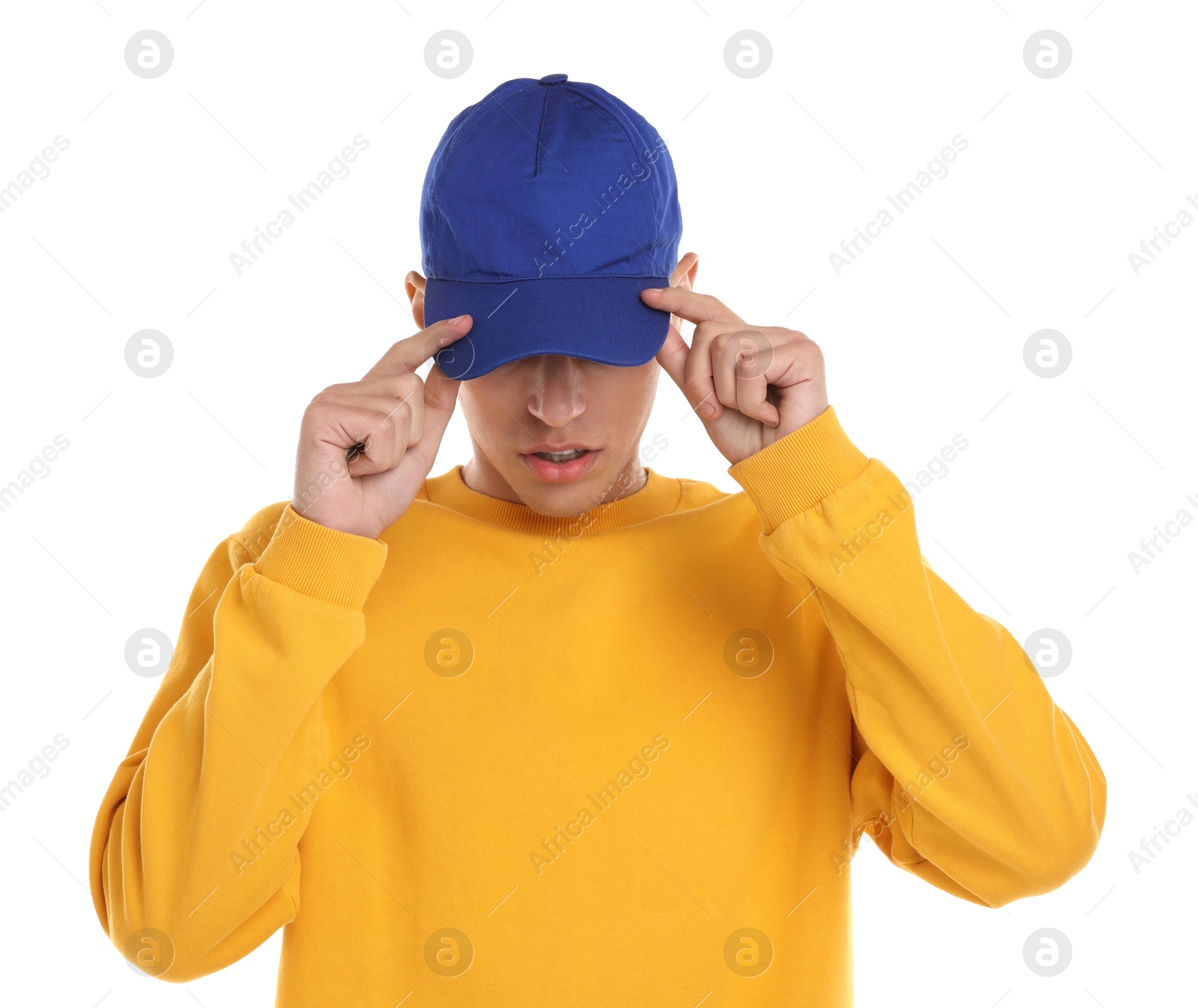 Photo of Man in stylish baseball cap on white background. Mockup for design