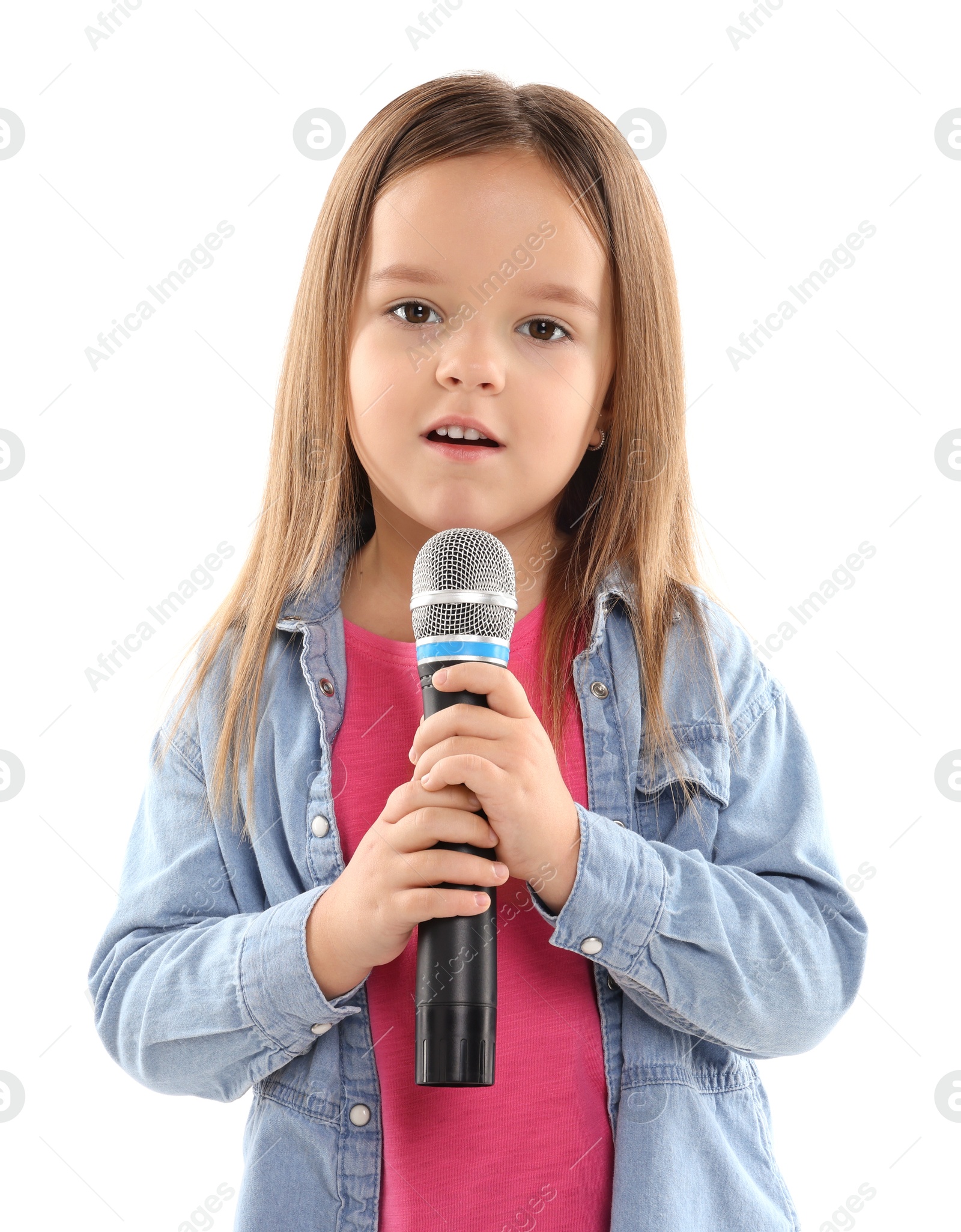 Photo of Cute girl with microphone singing on white background