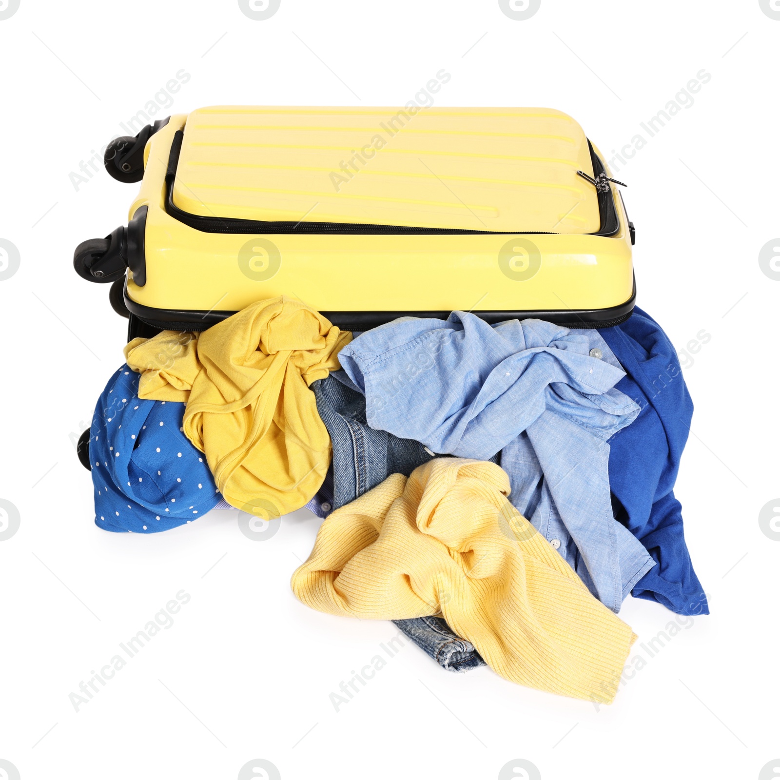 Photo of Suitcase full of different messy clothes isolated on white