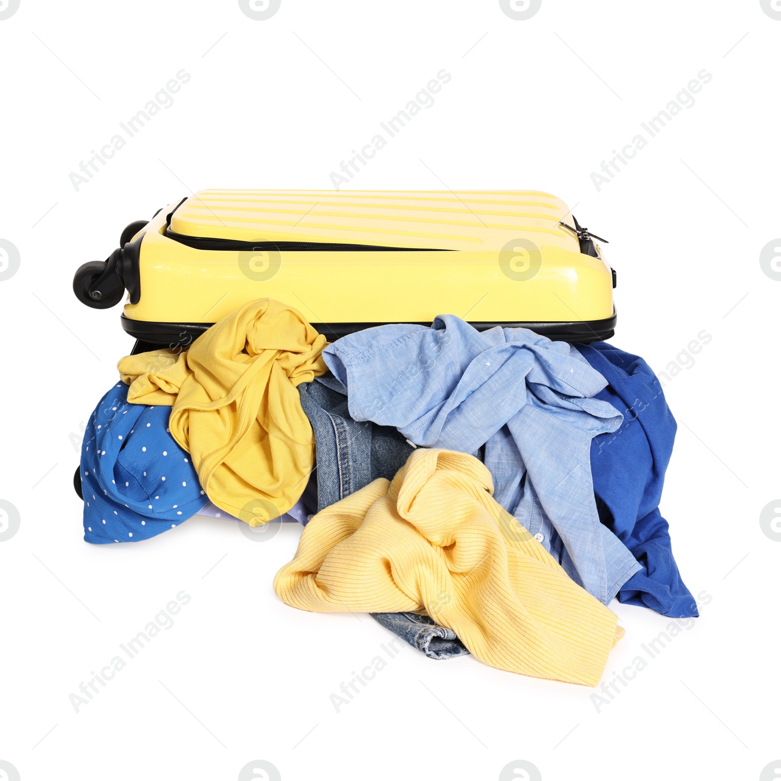 Photo of Suitcase full of different messy clothes isolated on white