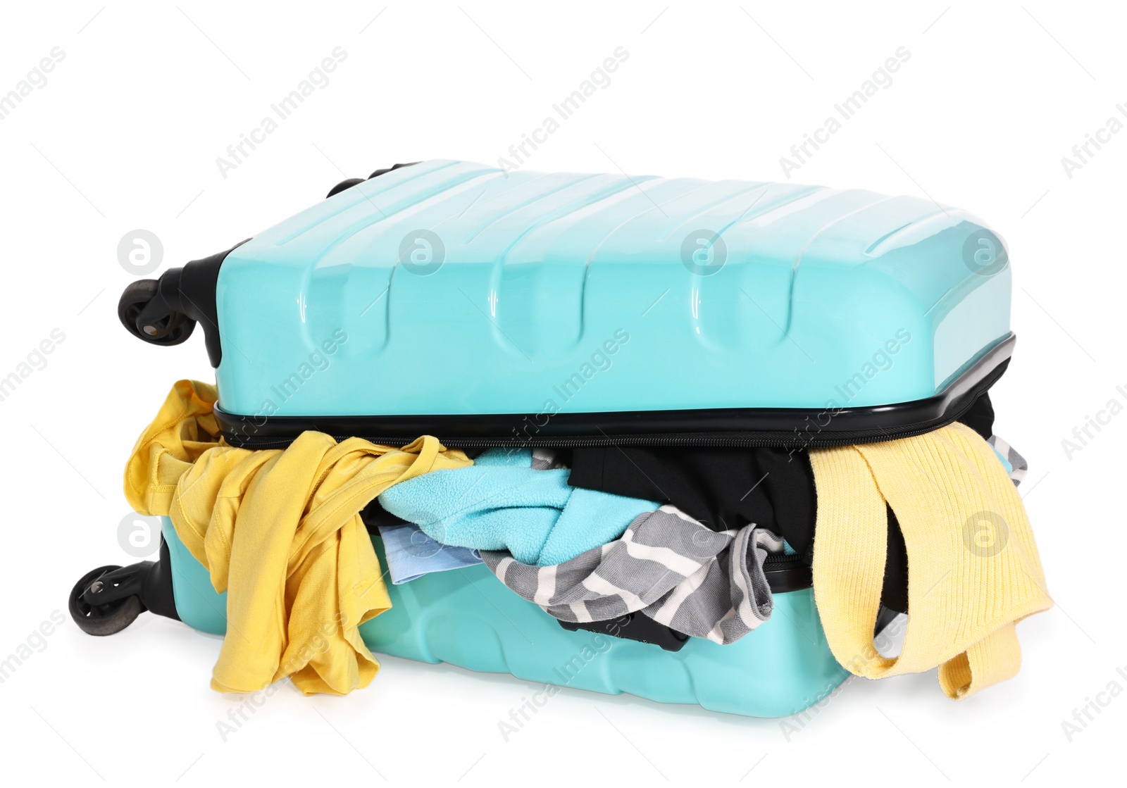 Photo of Suitcase full of different messy clothes isolated on white