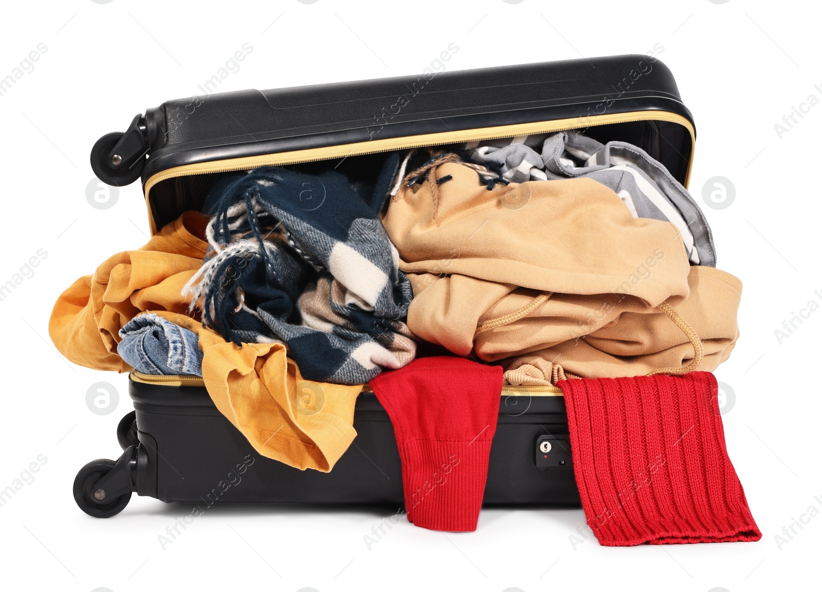 Packed suitcase full of clothes isolated on white Photo of Packed suitcase full of clothes isolated on white
