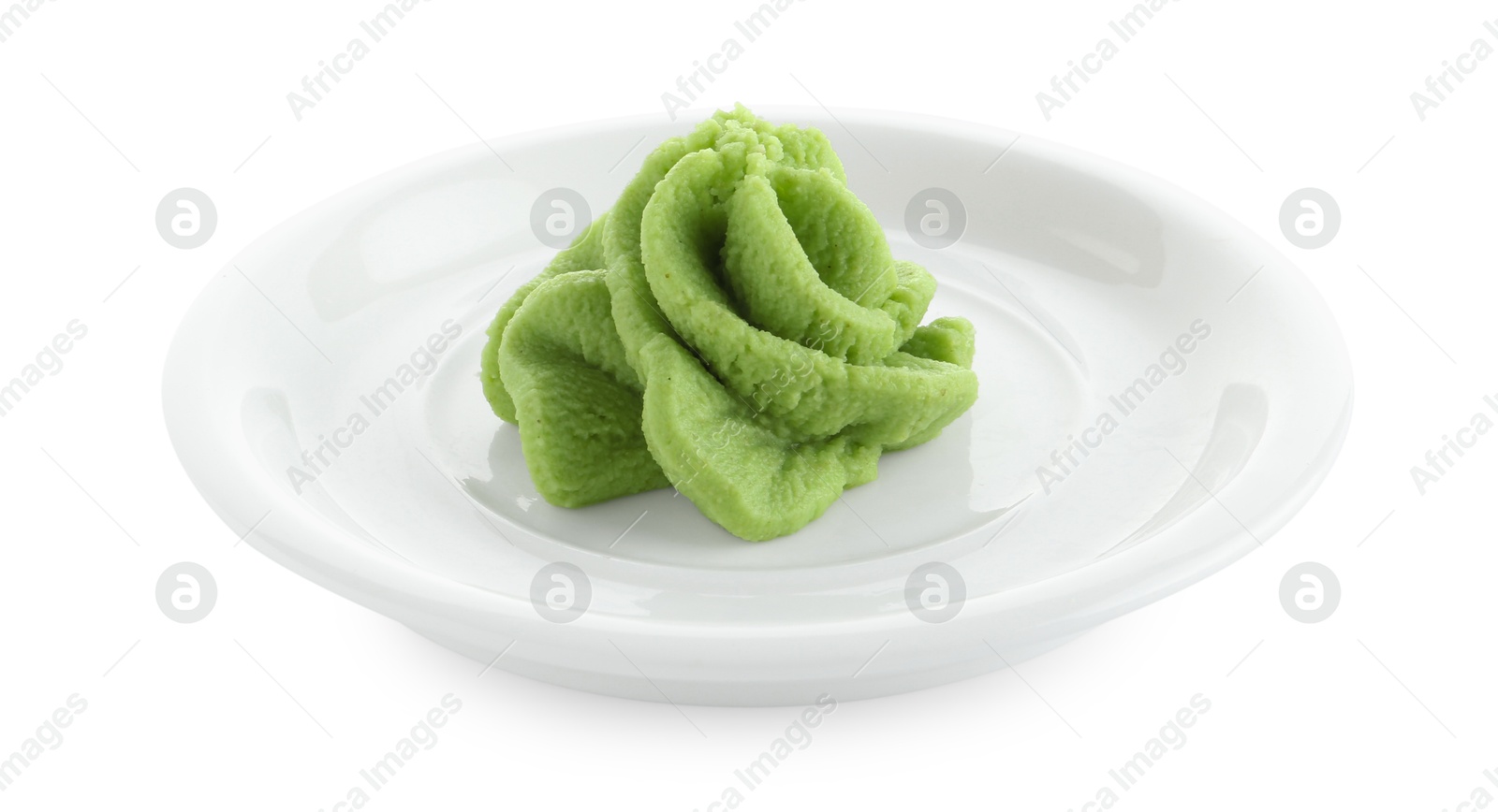 Photo of Plate with hot wasabi paste isolated on white