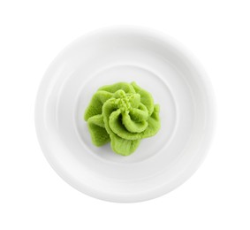 Photo of Plate with hot wasabi paste isolated on white, top view