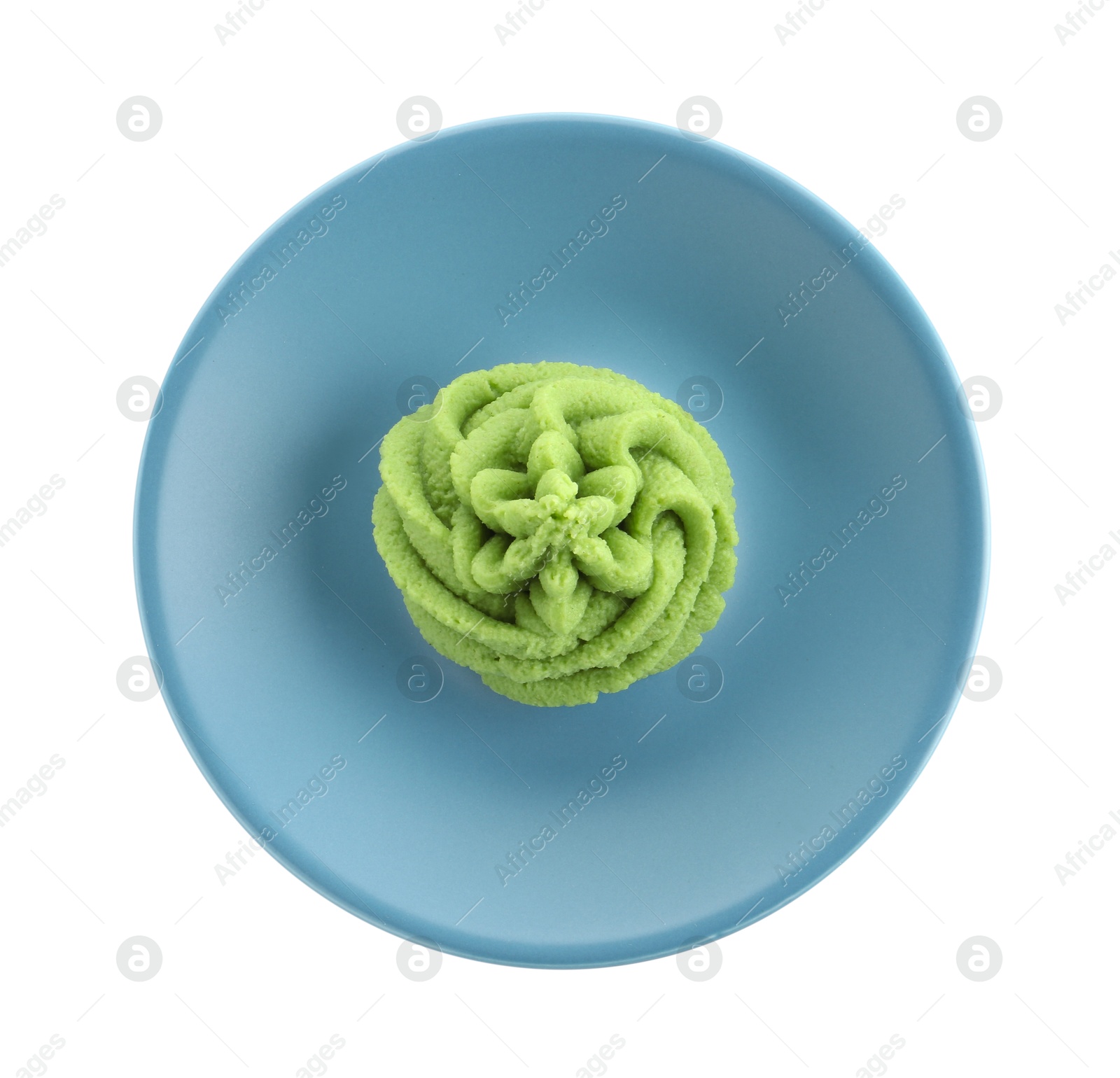 Photo of Plate with hot wasabi paste isolated on white, top view