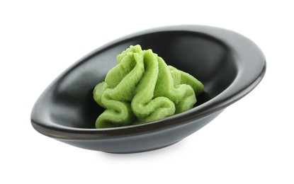 Photo of Hot wasabi paste in gravy boat isolated on white