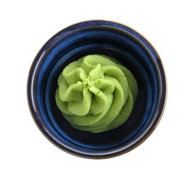 Photo of Hot wasabi paste in bowl isolated on white, top view