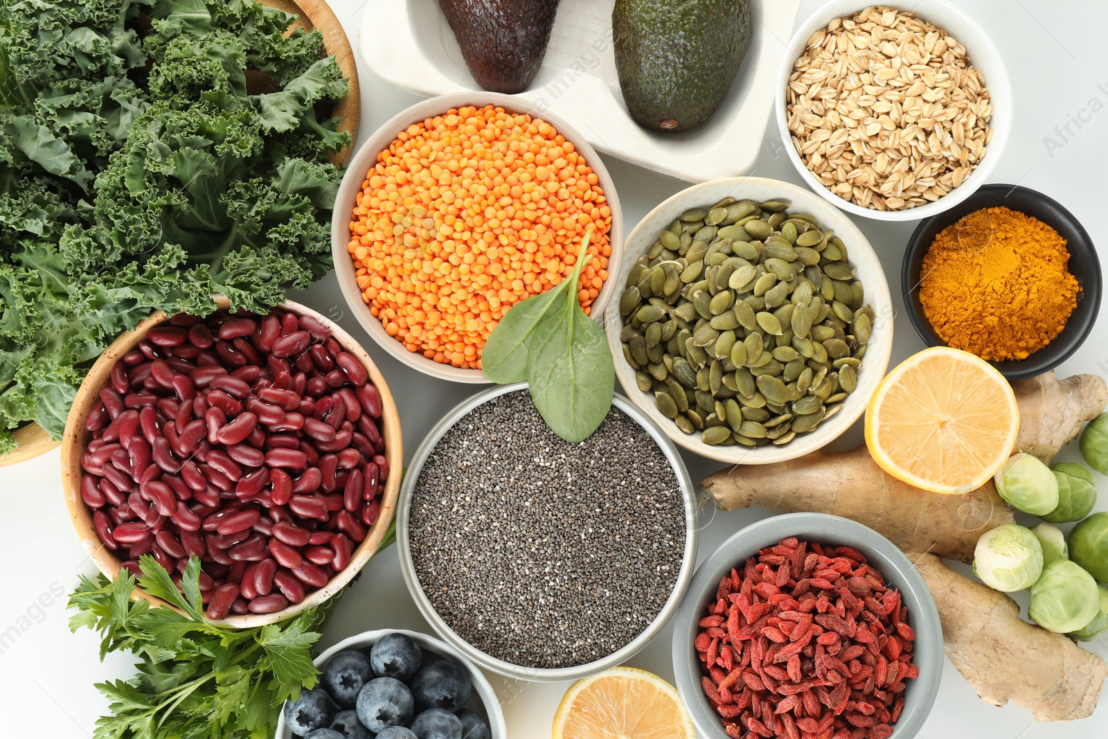 Photo of Superfood. Different healthy food products on white background, flat lay