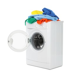 Photo of Modern washing machine with colorful laundry isolated on white