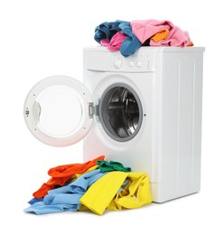 Photo of Modern washing machine with colorful laundry isolated on white