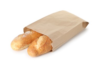 Photo of Freshly baked baguettes in paper bag isolated on white