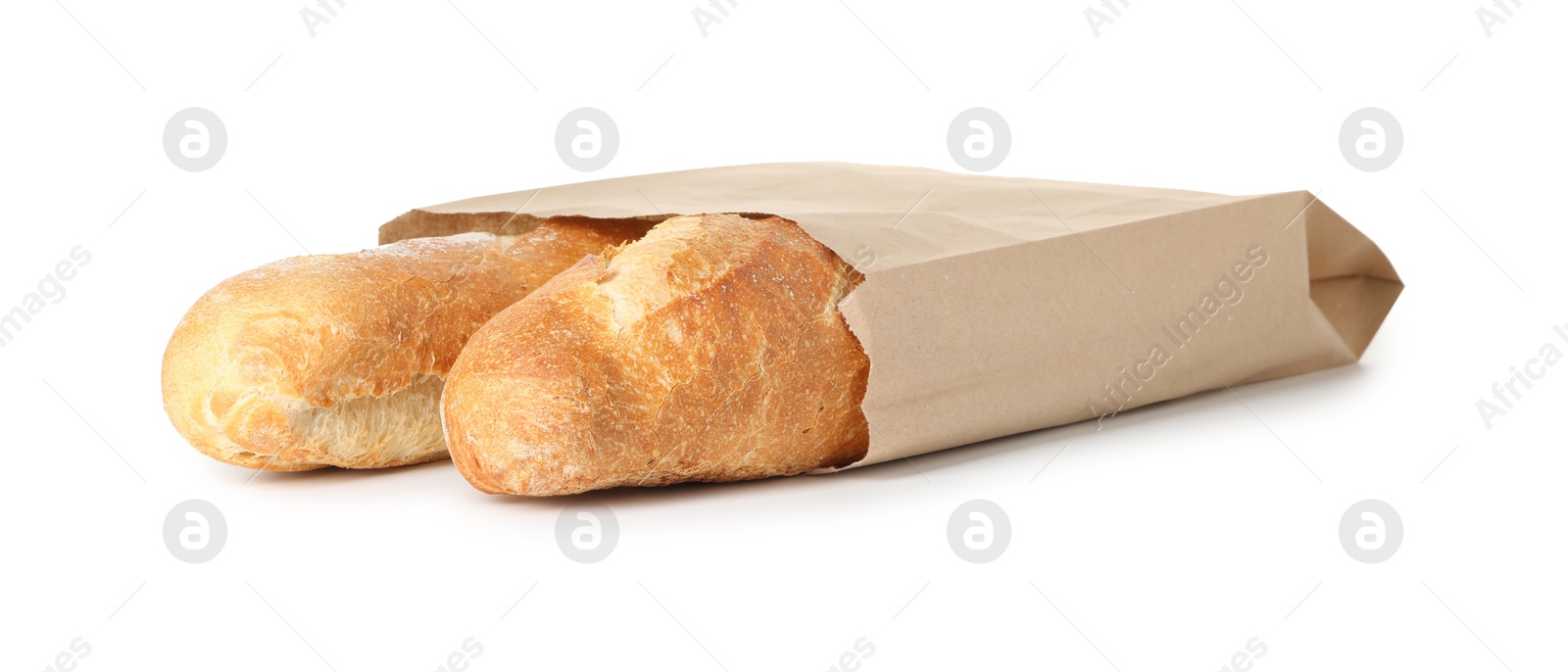 Photo of Freshly baked baguettes in paper bag isolated on white