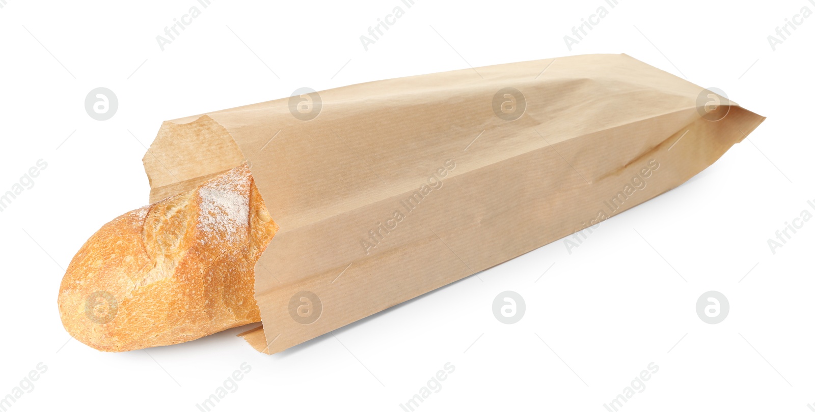 Photo of Freshly baked baguette in paper bag isolated on white