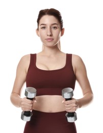 Photo of Woman in sportswear exercising with dumbbells on white background