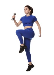 Photo of Woman in sportswear exercising with dumbbells on white background