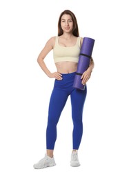 Woman in sportswear with fitness mat on white background