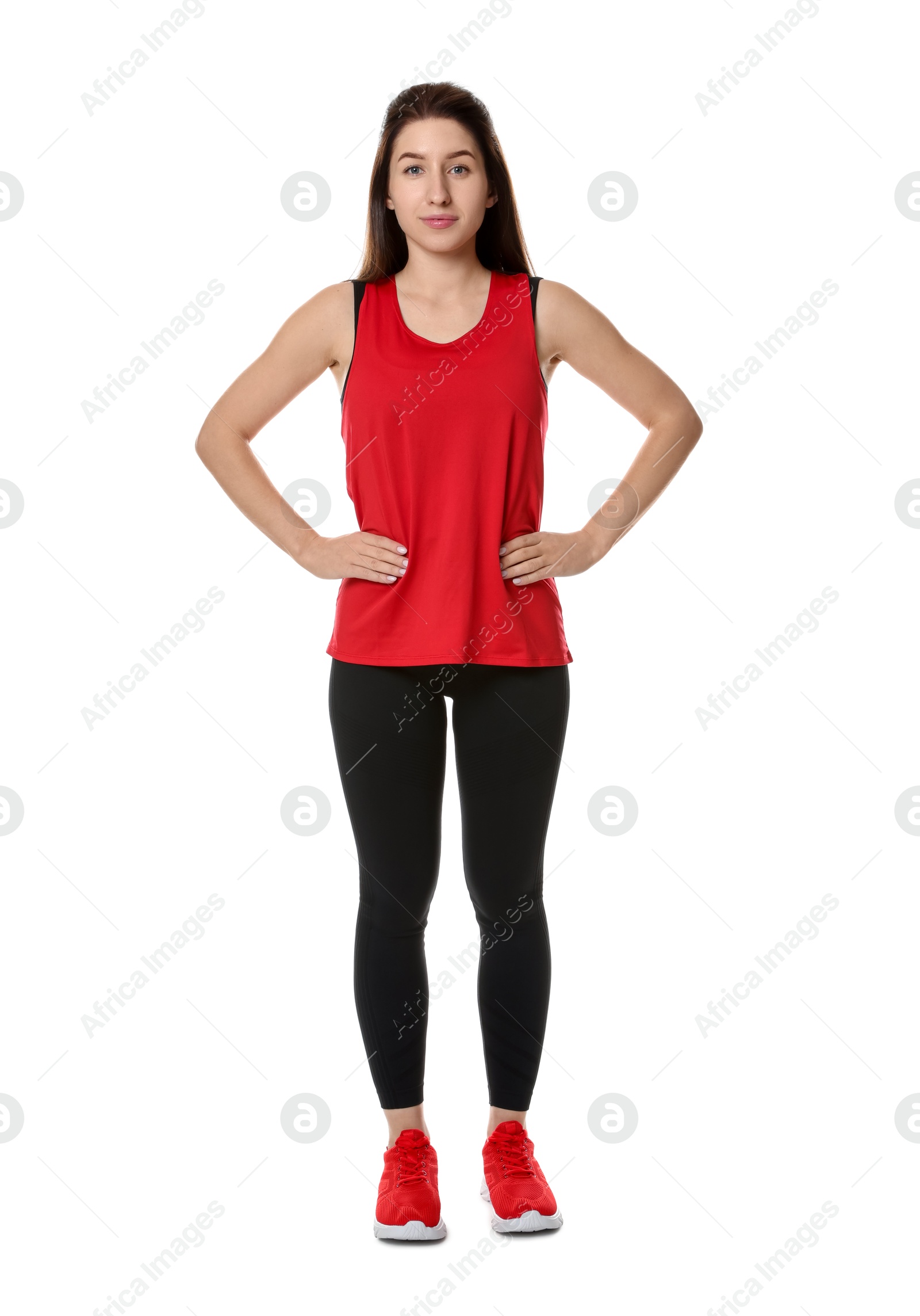 Photo of Portrait of woman in sportswear on white background