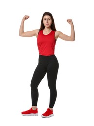 Photo of Woman in sportswear showing her biceps on white background