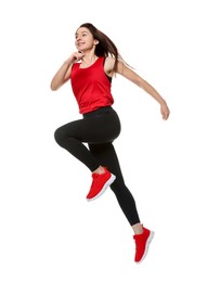 Photo of Woman in sportswear exercising on white background