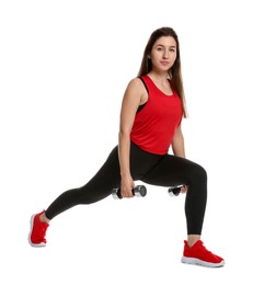 Photo of Woman in sportswear exercising with dumbbells on white background