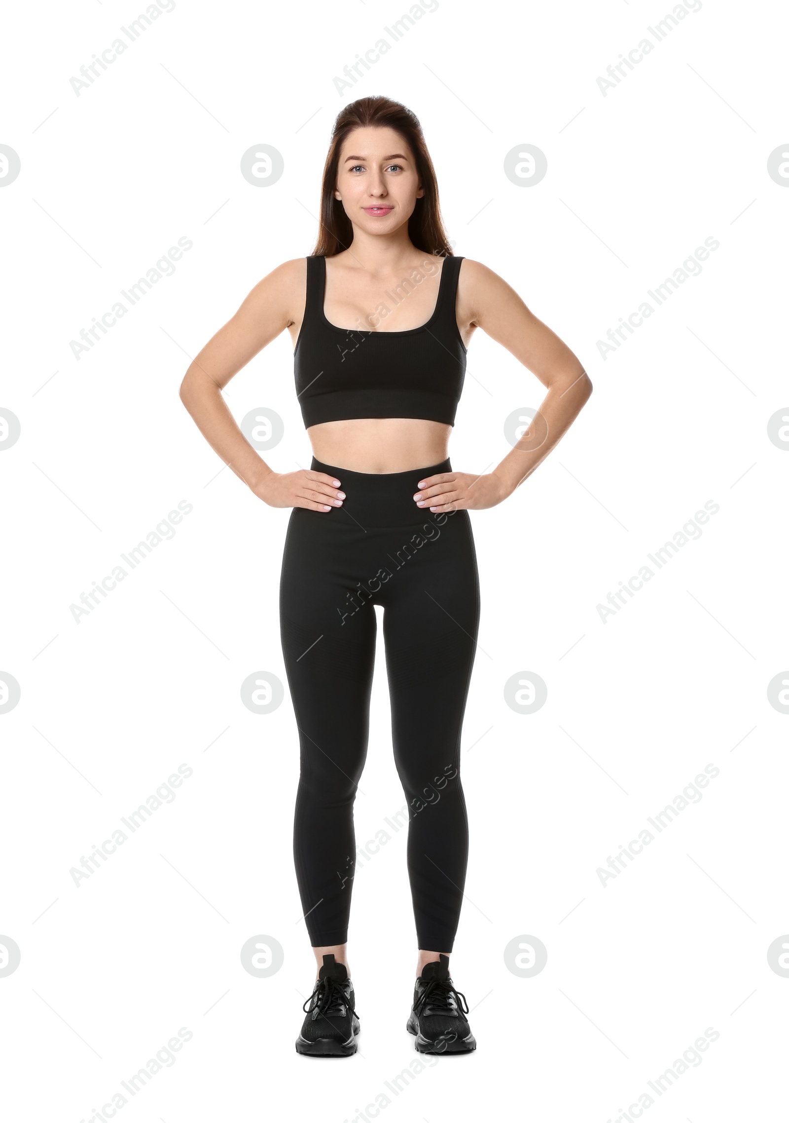 Photo of Portrait of woman in sportswear on white background