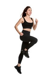 Photo of Woman in sportswear exercising on white background