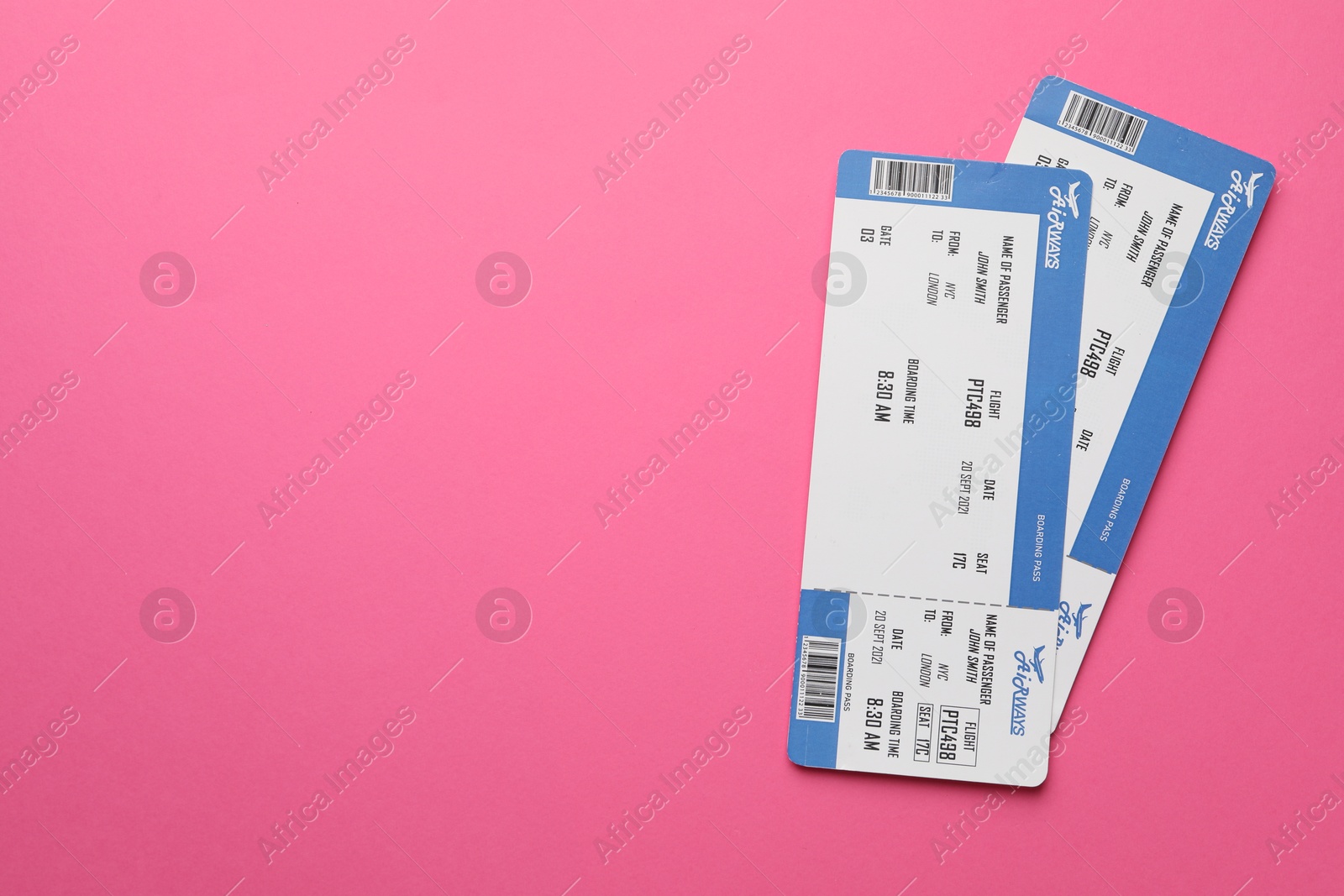 Photo of Travel agency. Flight tickets on pink background, top view. Space for text