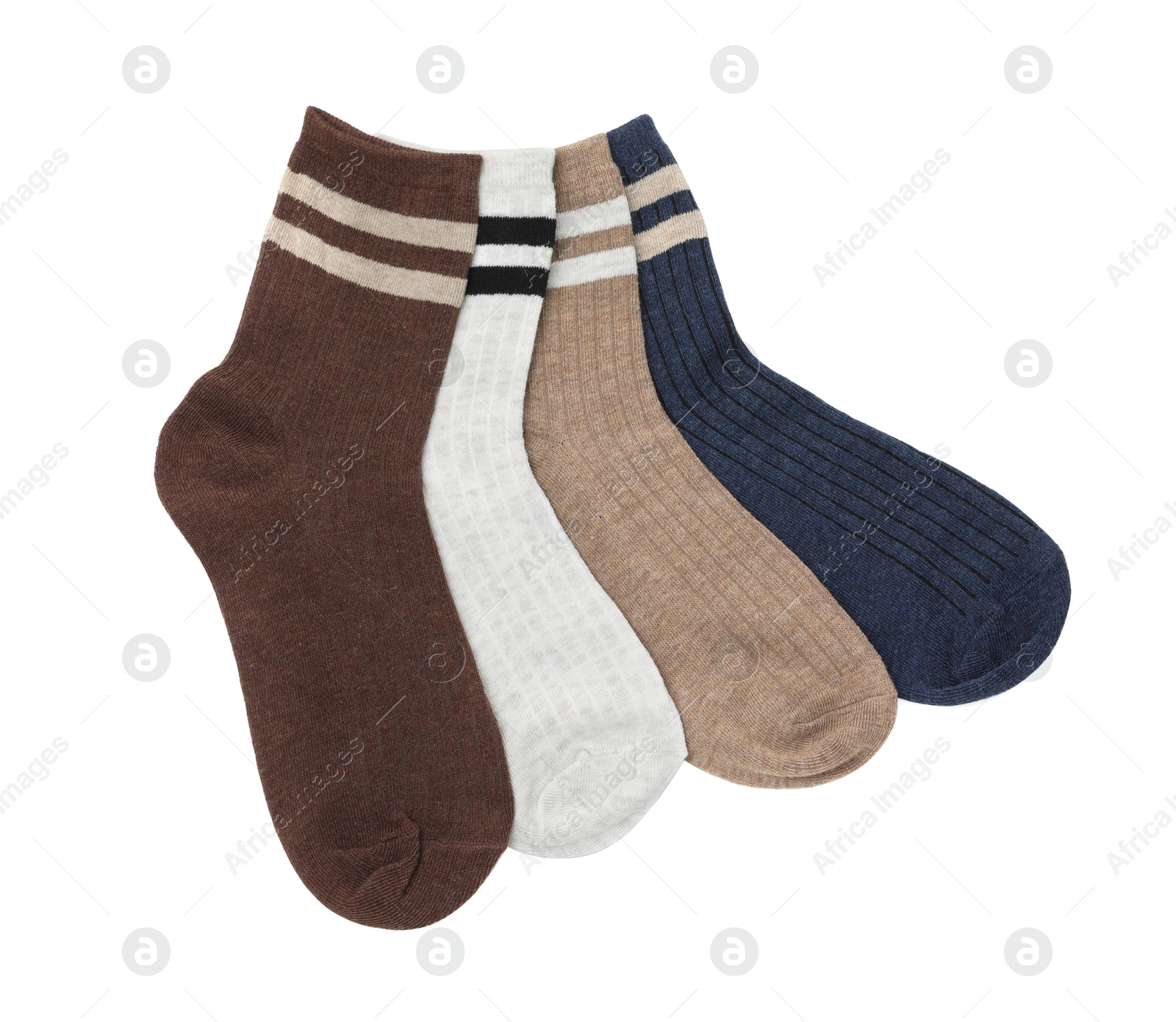 Photo of Different soft socks isolated on white, top view