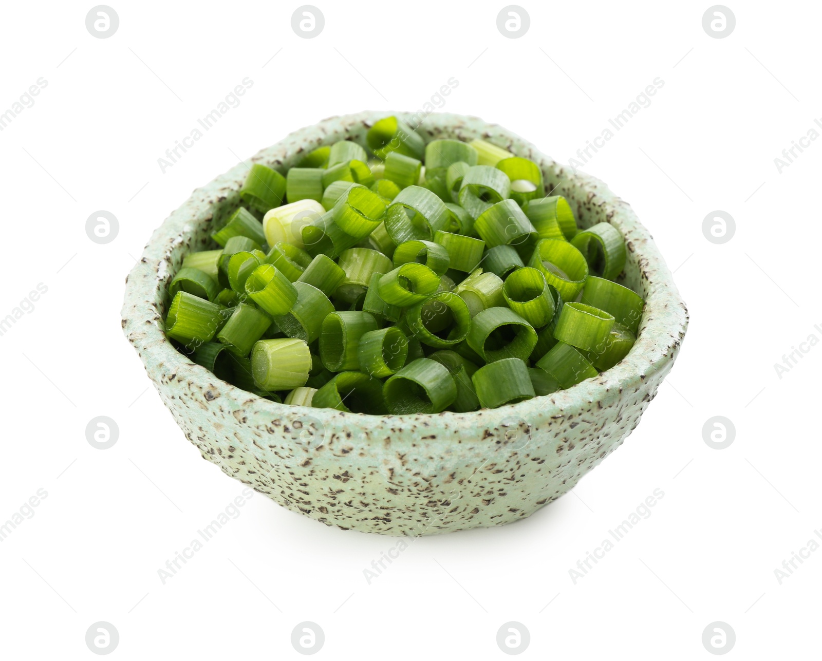 Photo of Chopped fresh green onion in bowl isolated on white